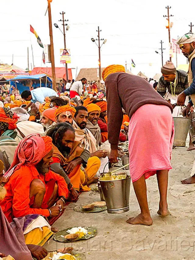 hindu-pilgrims-receiving-holy-prasad-kumbh-mela-2013-india-9546095386